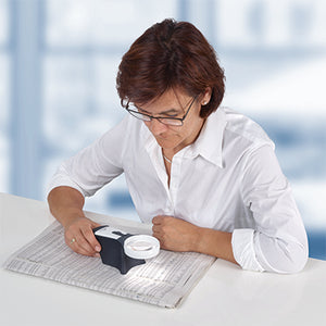 woman using ERGO Base with magnifier